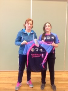 Deidre Hughes presenting Leanne Ryan (2nd Year) with the No. 14 jersey, the jersey that Deirdre wore with such pride and success during her camogie career.